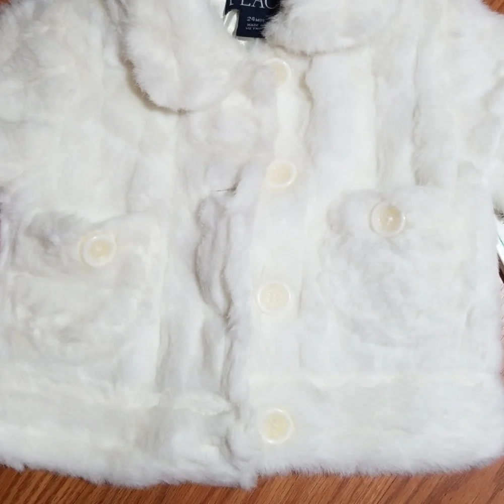 Winter white‎ fur jacket children place